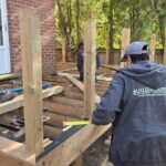Backyard wooden deck with railing